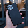 Bare Skin Case for iPhone 15 Pro - Full-Grain Leather Case with MagSafe for iPhone 15 Pro - Black - in Hand