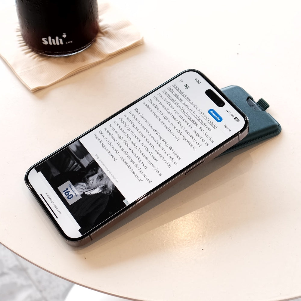 Bare Cases - MagSafe Wallet with Stand - on iPhone - Portrait Stand Mode - Low Angle - Front